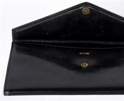 vintage gucci wallet black|pre owned gucci wallet.